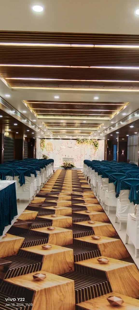 Guest seating facing a decorated engagement backdrop