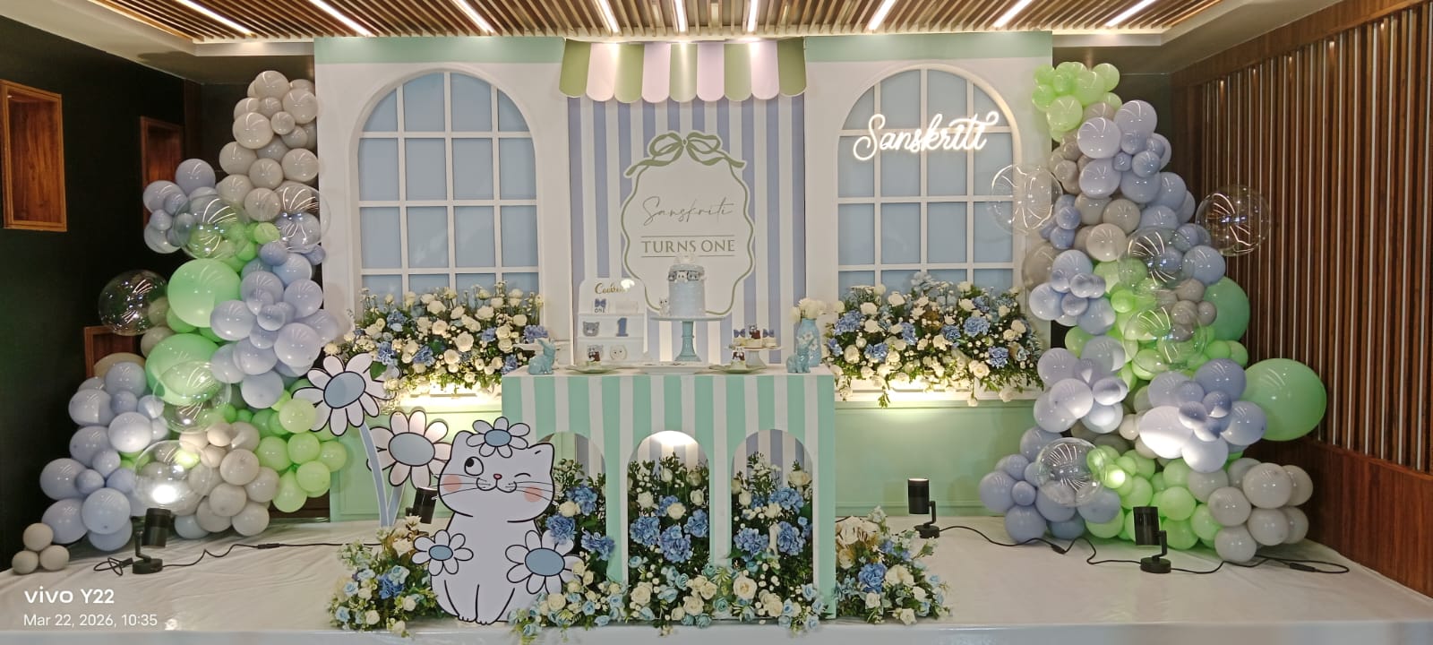 Pastel birthday celebration backdrop inside the banquet hall